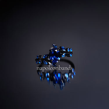 "Midnight Bloom" – Blue Sapphire Black Engagement Ring with Sapphire Leaf Accents