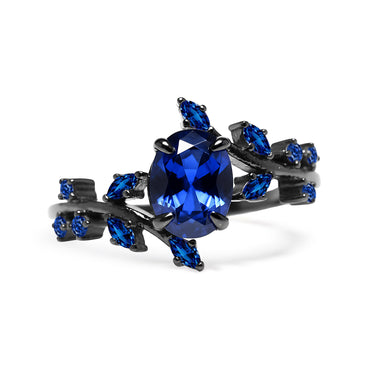 "Midnight Bloom" – Blue Sapphire Black Engagement Ring with Sapphire Leaf Accents